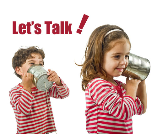 Two children playing speak and hear