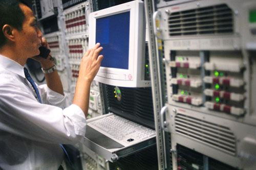 A-man-in-front-of-PC-and-se A man in front of PC and se