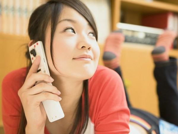 Pretty Girls at home Japanese girl on cell phone