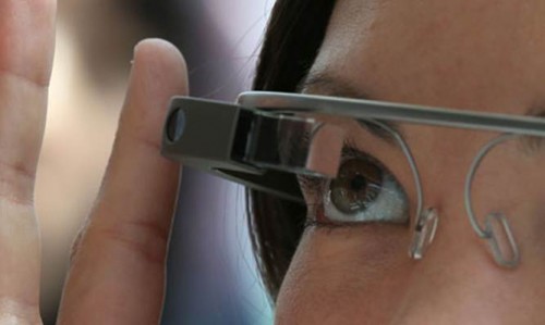 Woman using Google glass at a technology festival