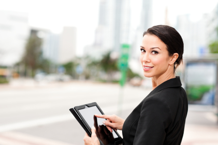 woman using tablet outside