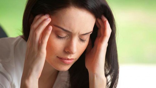 Attractive woman in pain